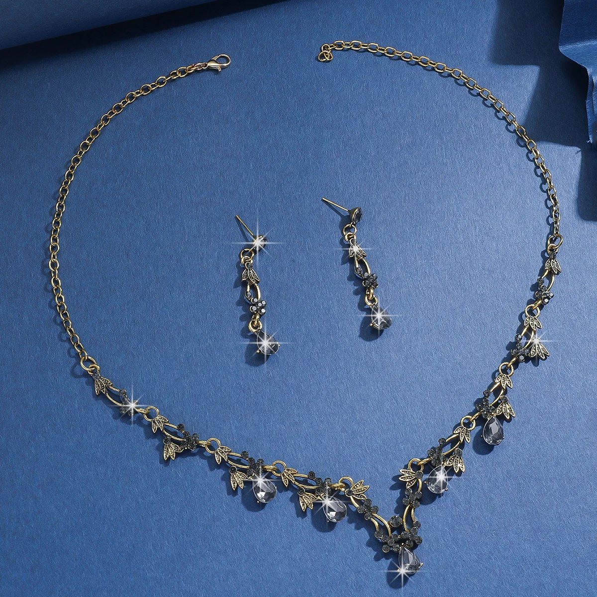 1 ensemble de colliers et boucles d'oreilles en chaîne à griffes incrustées de cuivre à la mode, ensemble de bijoux, fête de Banquet de mariage pour femmes, nécessités quotidiennes